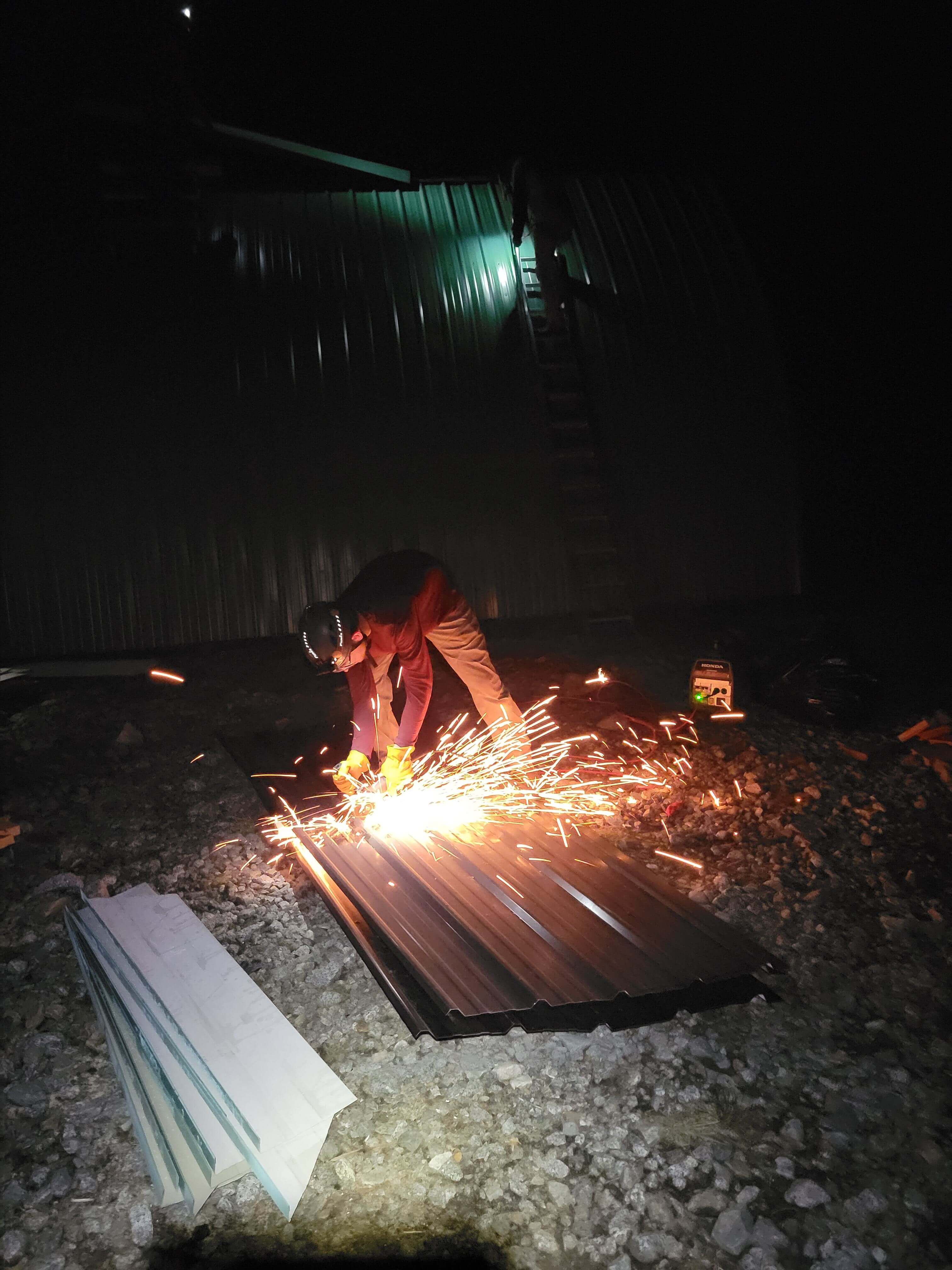 Jacob cutting up spare sheet metal for storage. PC: Anton Afanassiev