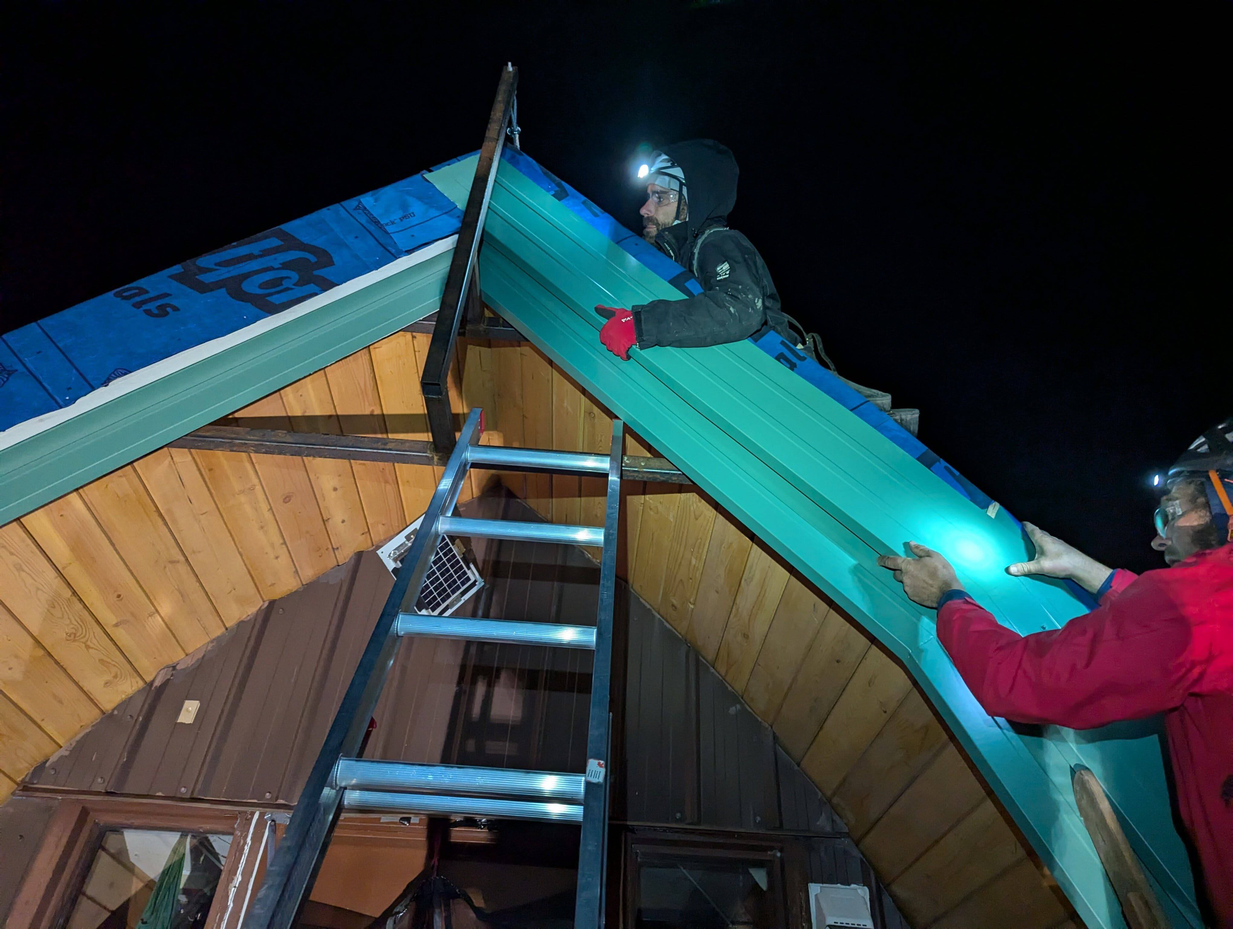 John and Jeff align a piece of flashing. PC: Jacob Grossbard