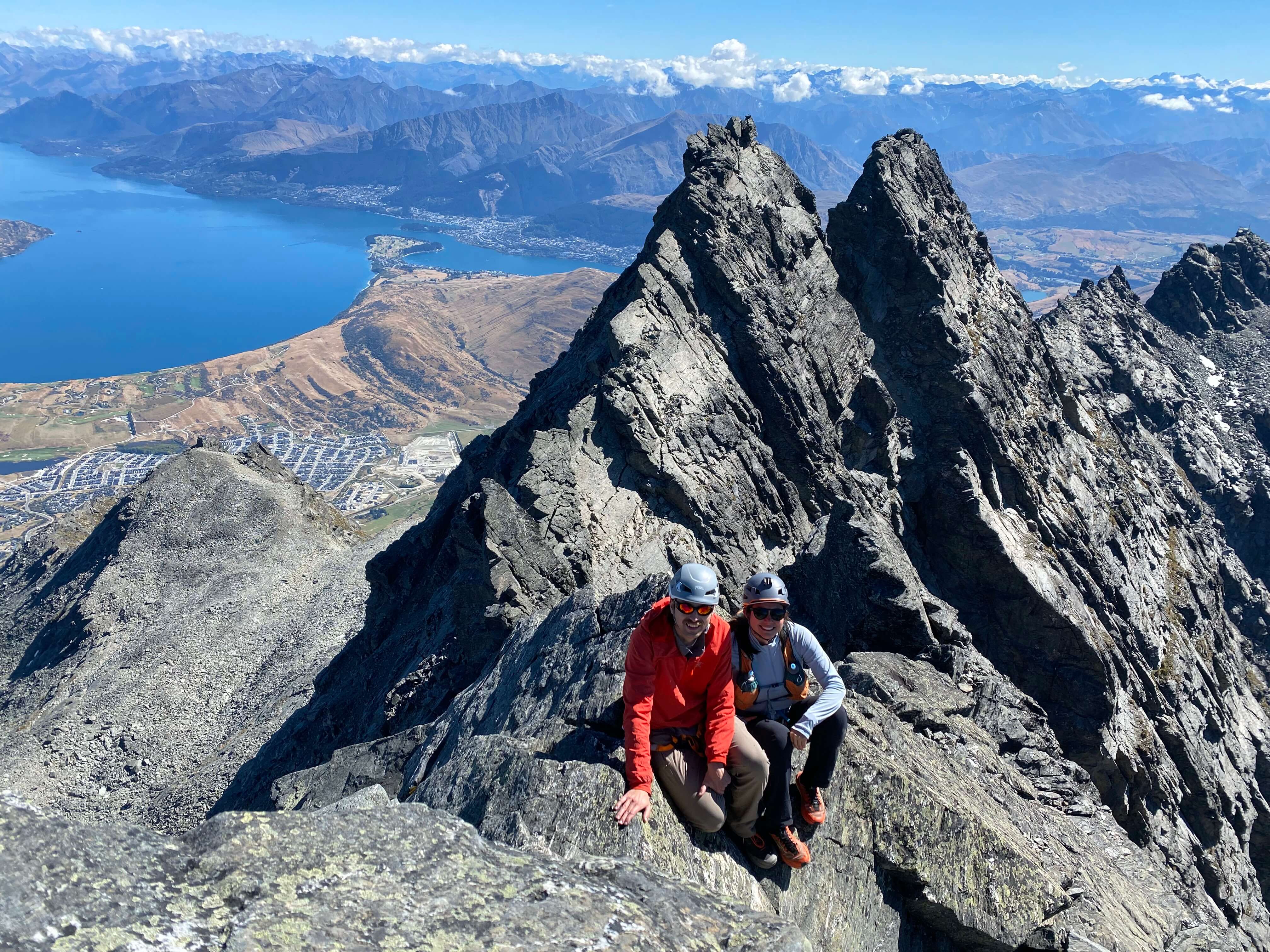 Kathleen and I on the summit with a view of Double Cone. PC: Michelle Podrebersek